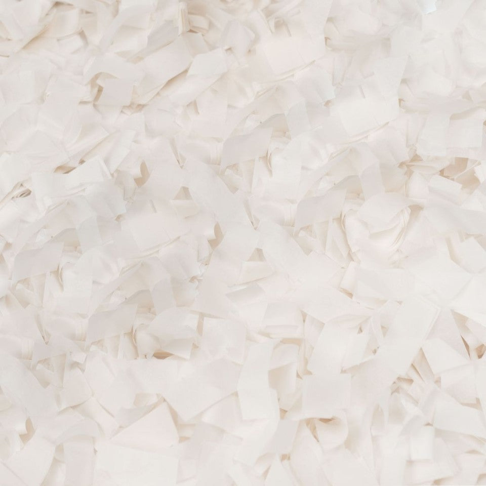 white confetti from confetti cannon