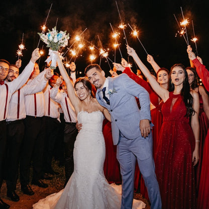 bride and groom sendoff under wedding sparklers