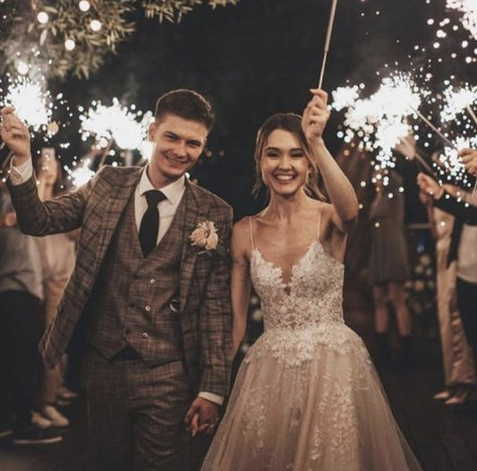 bride and groom sendoff with wedding sparklers